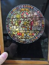 A VINTAGE FRAMED SMALL STAINED GLASS WINDOW ON STAND