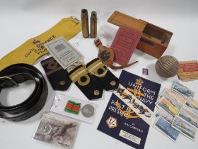 A BOX OF MILITARY ITEMS AND COLLECTABLES ETC