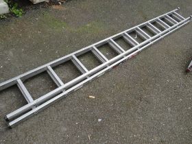 AN ALUMINIUM EXTENDING YOUNGMAN 3.37 M DOUBLE LADDER