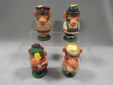 Four vintage PG tips monkey egg cups