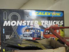 A Scalextric monster trucks (unchecked)