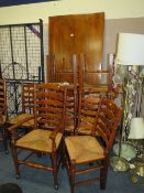 A large modern refectory dining table with eight wicker seat chairs