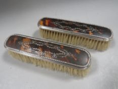 A pair of antique silver pique brushes Birmingham 1919