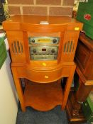 A modern classical style radio CD player on stand