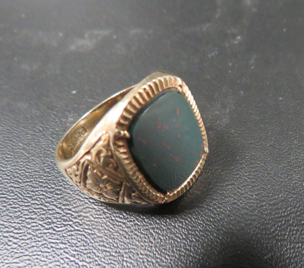 A hallmarked 9 carat gold blood stone ring approx weight 8.8 g