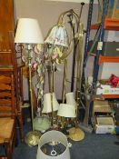 A quantity of assorted standard lamps and table lamps. House Clearance A/F