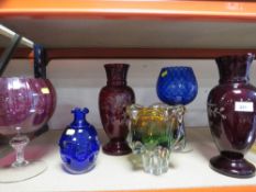 A selection of coloured and studio glassware