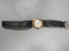 A hallmarked 9 carat gold wrist watch on leather strap A/F