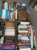 Four trays of mainly vintage and modern hard back books