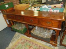 A modern cherrywood four drawer dresser width 181 cm