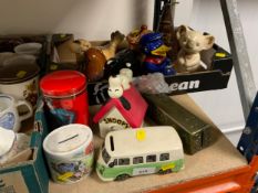 A collection of assorted money boxes to include a Snoopy example