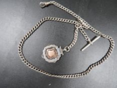 An antique silver double albert silver mens pocket watch chain