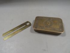 A collection of military badges and items to include a 1945 dated 