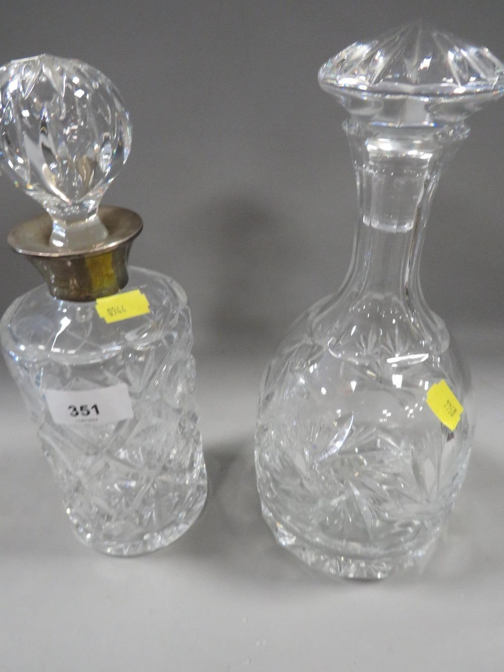 A hallmarked silver collared example plus another