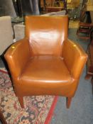 A modern leather style club armchair
