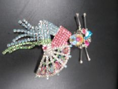 A Butler & Wilson brooch in Mikado style design