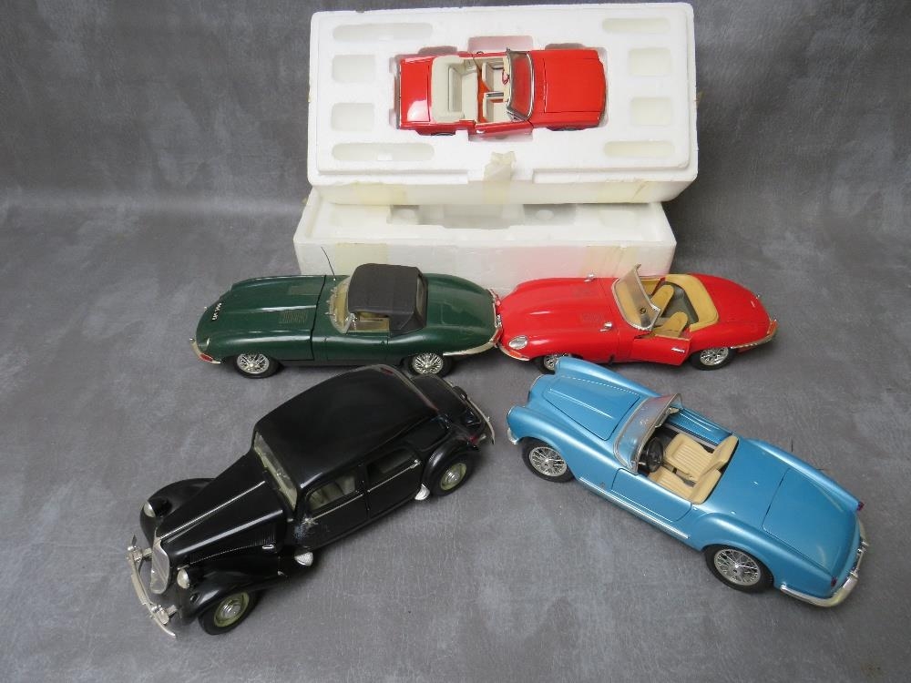A BOXED FRANKLIN MINT FORD THUNDERBIRD, together with four unboxed 1:18 cars to include Maitso
