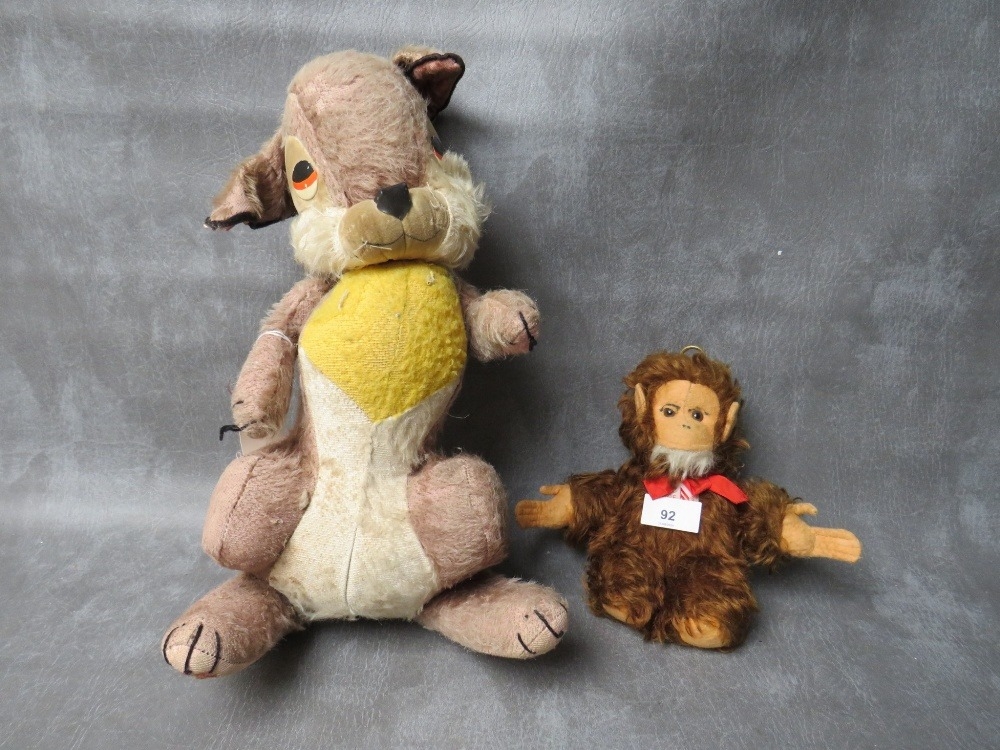 A VINTAGE MERRYTHOUGHT MUSICAL 'THUMPER' SOFT TOY, H 41 cm, together with a musical Music Reuge bear