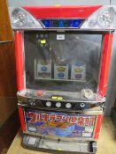 A JAPANESE ELECTRONIC REEL TABLE TOP FRUIT MACHINE, with glazed top front panel, set up for token