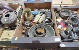 Three trays of assorted metal ware to include figures, candlesticks etc