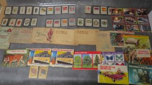 A TRAY CONTAINING A LARGE COLLECTION OF CIGARTTE AND TEA CARDS, both loose and in albums, collection