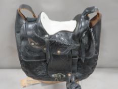 An unusual black and white Mexican made leather horse saddle handbag
