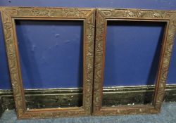 A PAIR OF 19TH CENTURY CARVED WOODEN DECORATIVE FRAMES, frame W 6.56 cm, rebates 60 x 39 cm
