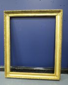 A 19TH CENTURY GOLD FRAME, with fruit and leaf design to outer edge, frame W 11 cm, rebate 101 x
