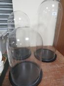 A set of three graduated display domes