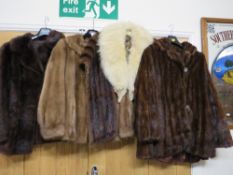 Three vintage fur coats together with a fur collar, vintage fur stole and two piece retro style skir