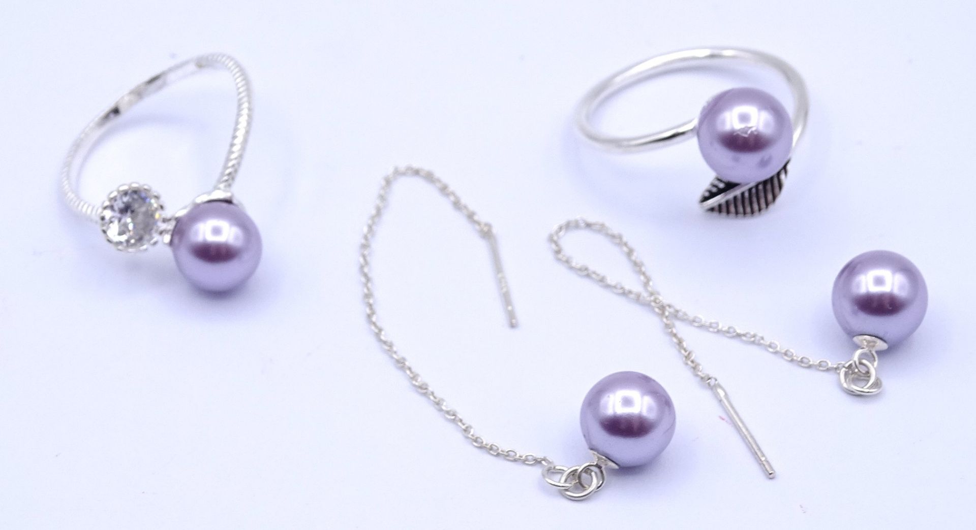 Paar Ohrringe mit Perlen, Silber 0.925, Schieber fehlen, L. 7,5cm, zus. 2,0g.