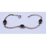 Silber Armband mit Onyx, Silber 925/000, L. 19,5cm, 8,7g.