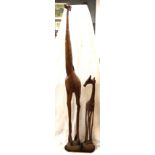 Paar hohe Holz-Giraffen, neuzeitl., beide auf Platte befestigt, ca. H-148cm B-33,5cm T-18,5cm. Nur