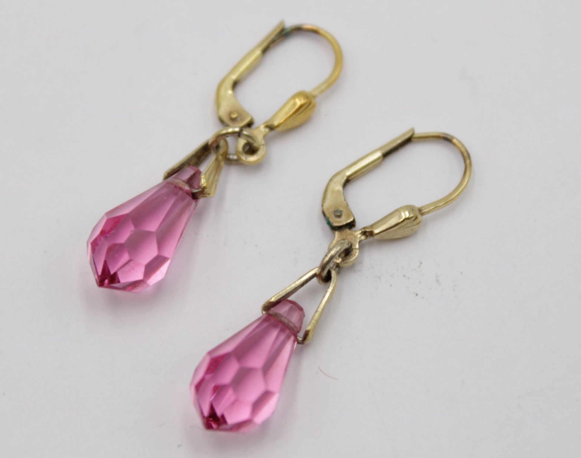 Paar Ohrhänger, 925er Silber vergoldet, rosa facc. Steine, 3,1gr., L-3,7cm.