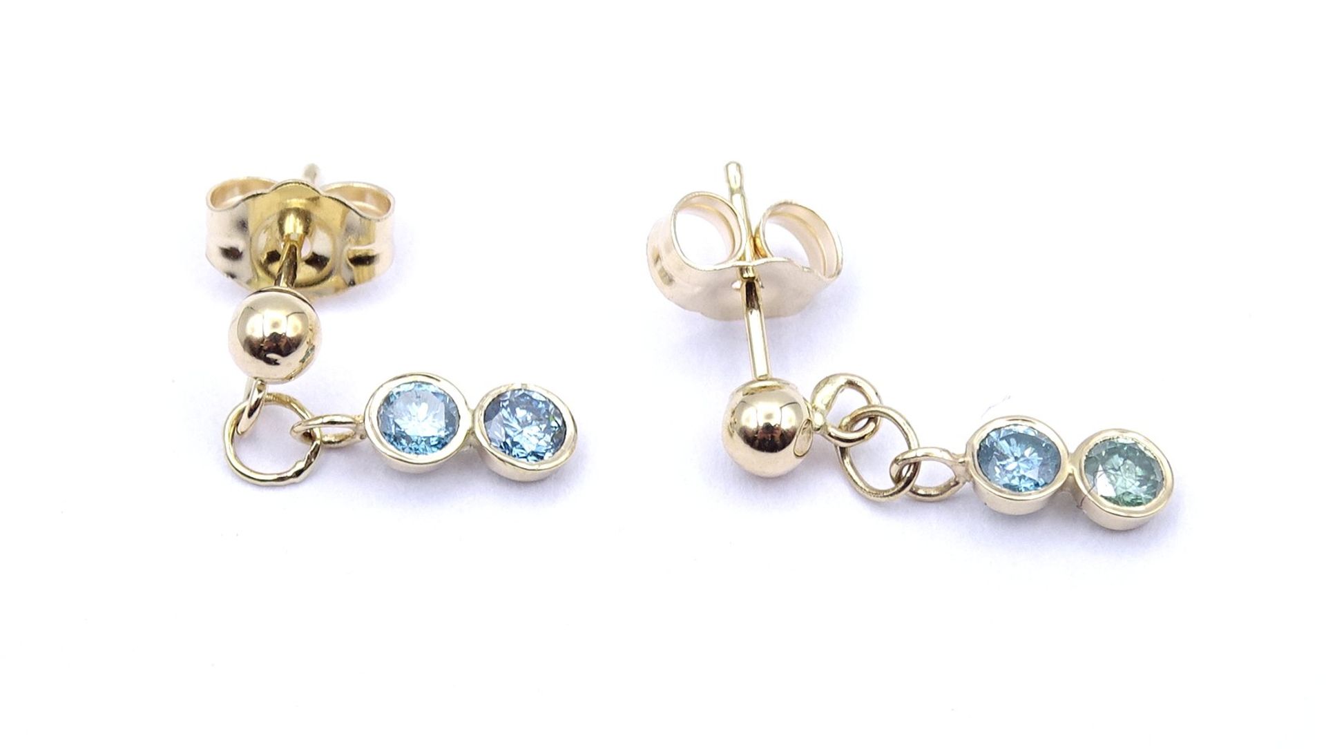 Paar Gold Ohrstecker / Hänger ,14K mit blauen Diamanten zus. 0,28ct. L. 1,6cm, zus. 0,67g., ein Dia