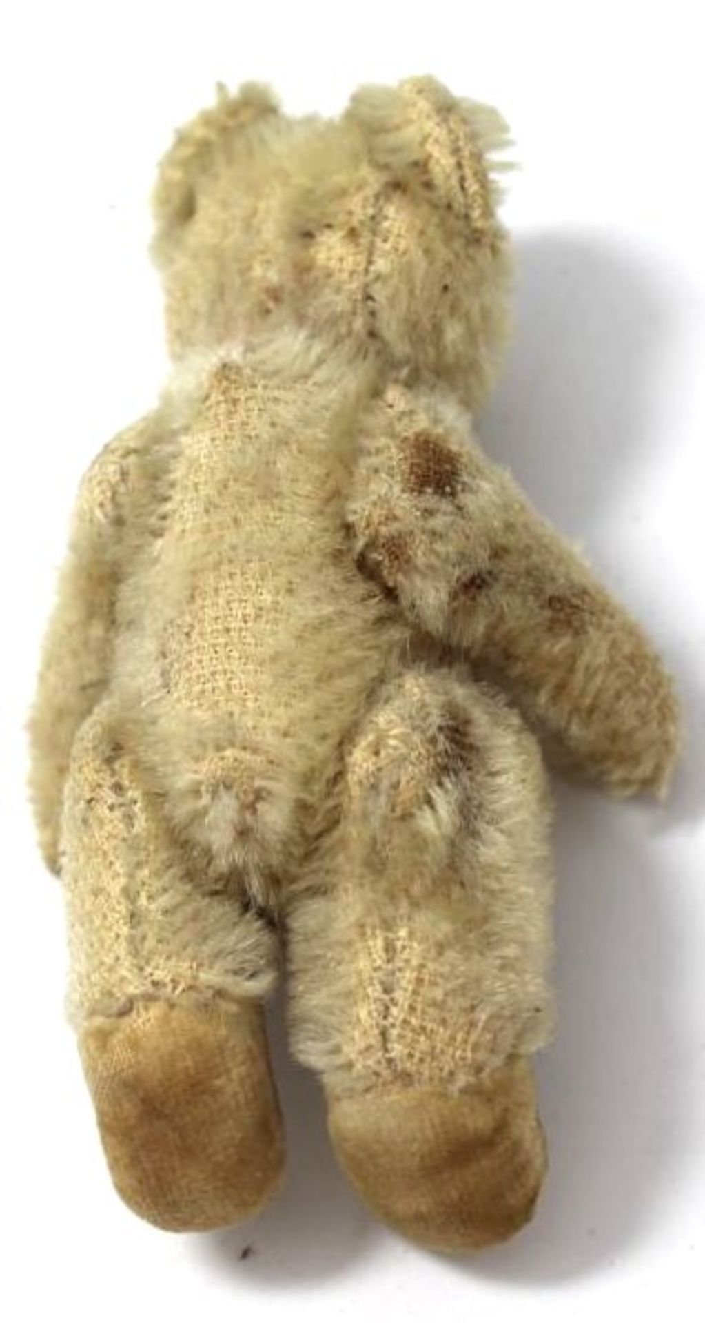 kl. Teddy, wohl Schuco?, H-8 cm, bespielt - Bild 4 aus 4