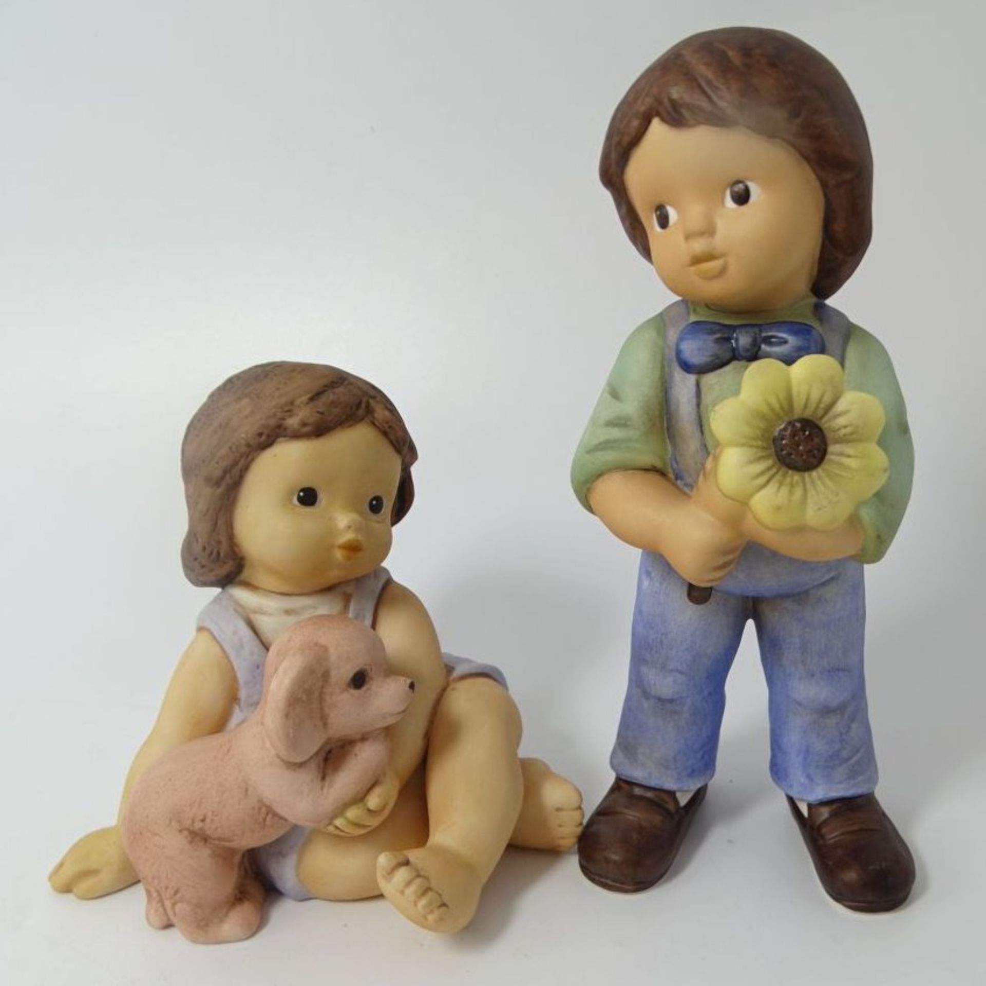 2x Limpke Figuren "Nina und Marco", H-9 und 14 cm