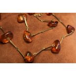 Stabkette mit Bernsteinen, Gold-333-,16,5 gr., L-ca. 60 cm