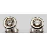 585er WG-Ohrstecker mit zus. 0,52 ct Diamanten, zus. 1,1gr. ca. D-0,6cm