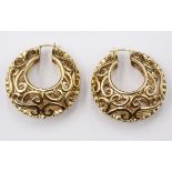 Paar schwere Modeschmuck-Ohrhänger, besetzt mit klaren Steinen, ca. D-4cm