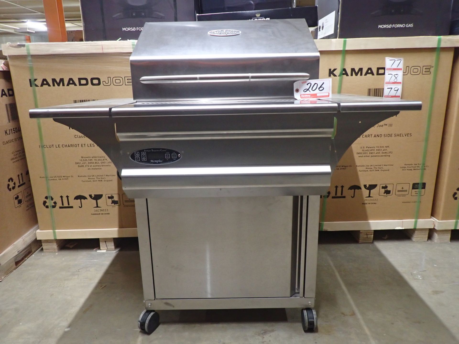 MEMPHIS ADVANTAGE PLUS 430 S/S FREE STANDING WOOD FIRE GRILL (MSRP $3,200) (1 BENT CASTER)