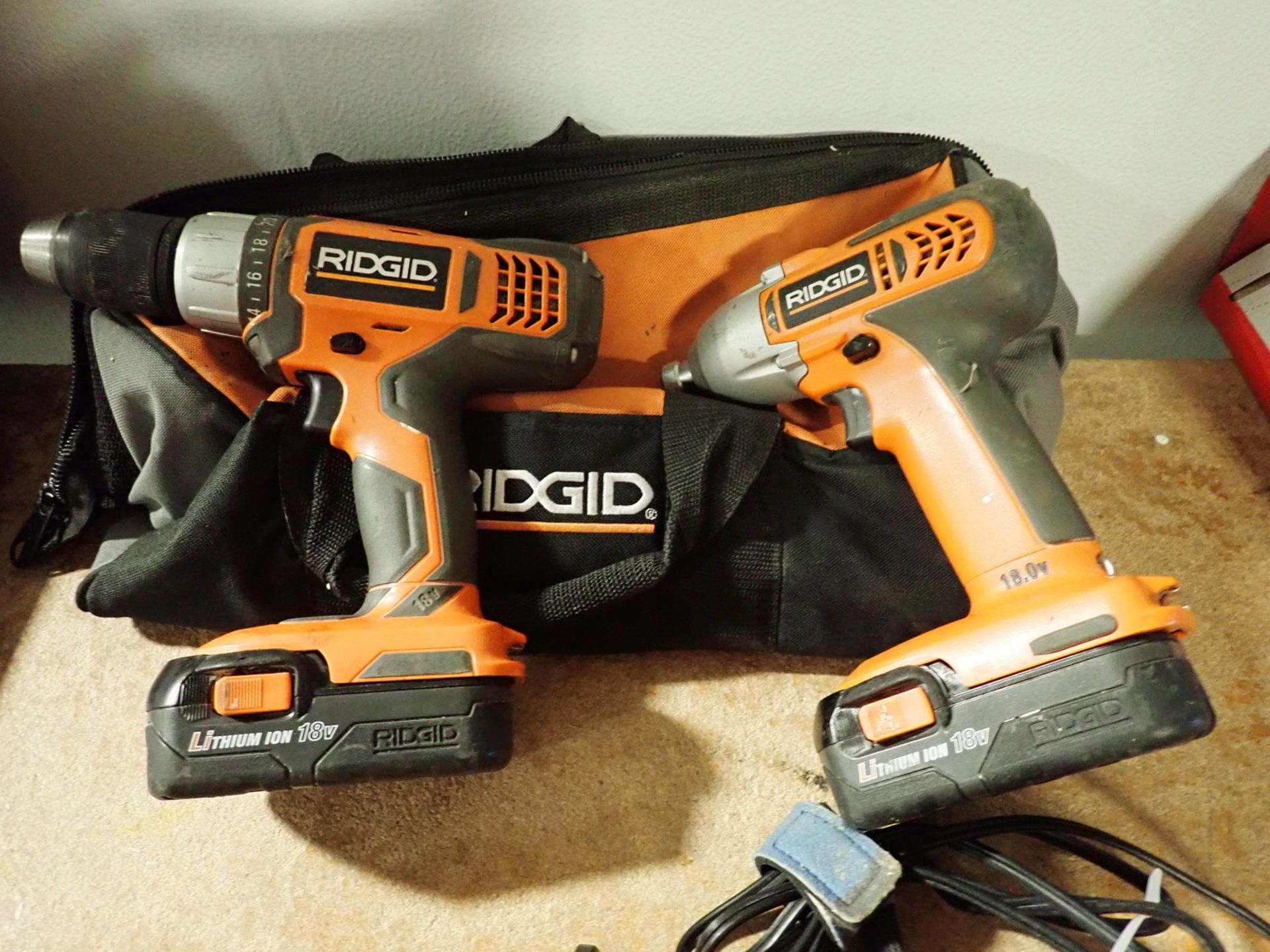 LOT - RIDGID, & DEWALT 18V BATTERY DRILLS W/ CHARGERS & CARRYING CASE - Image 2 of 2