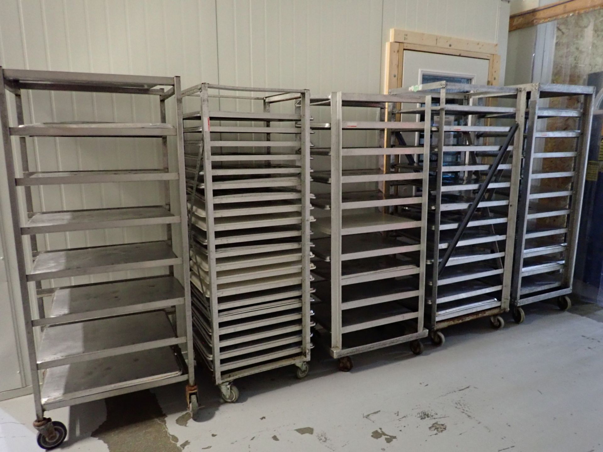 UNITS - ASSORTED STAINLESS STEEL RACKS & BAKE TRAY RACKS C/W TRAYS