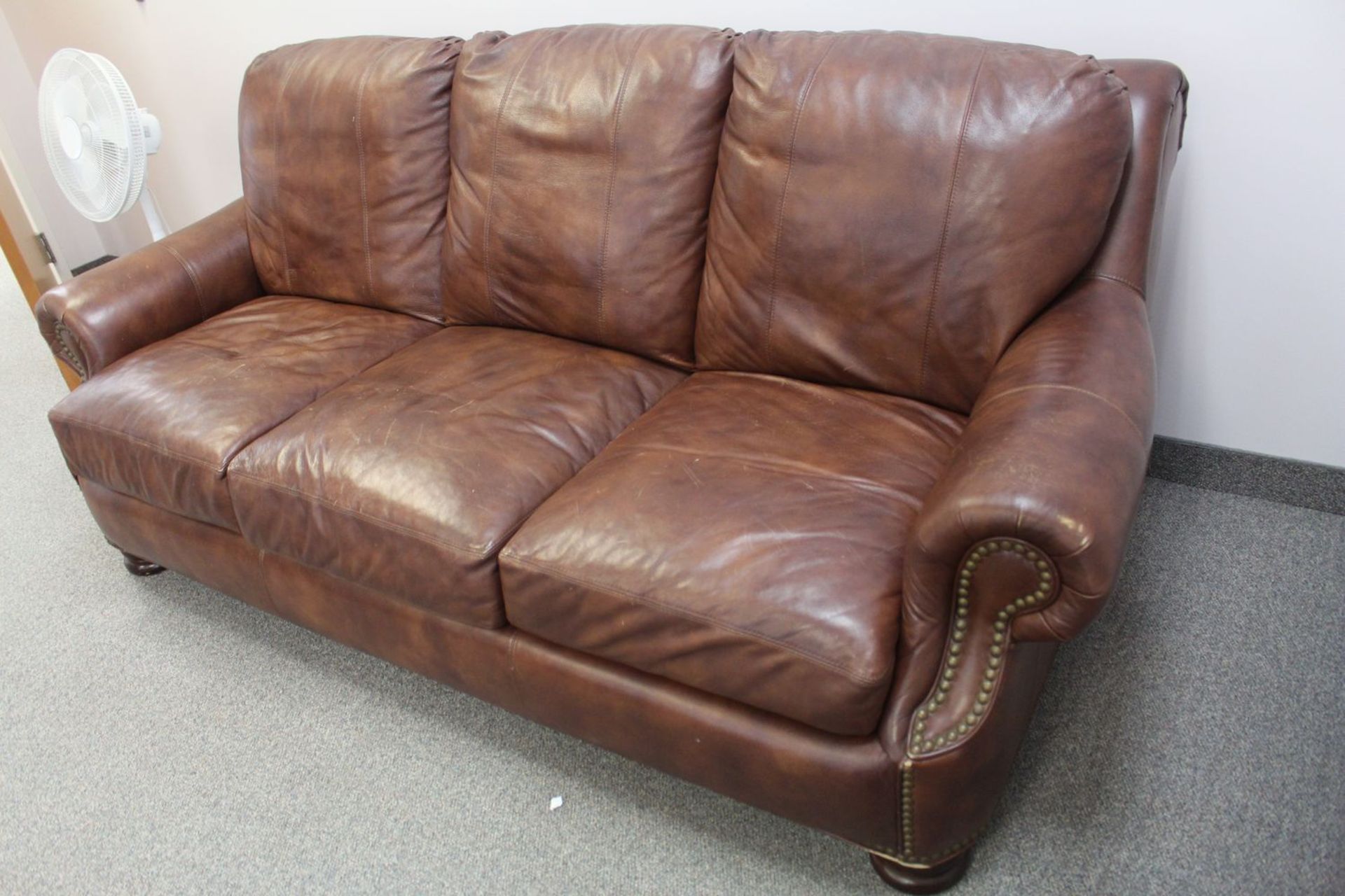 BROWN LEATHER 3-SEAT SOFA W/ STUDS - 88"L X 45"D X 36"H (LOCATED AT: NIAGARA ON-THE-LAKE, ONTARIO - Image 2 of 3