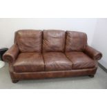 BROWN LEATHER 3-SEAT SOFA W/ STUDS - 88"L X 45"D X 36"H (LOCATED AT: NIAGARA ON-THE-LAKE, ONTARIO