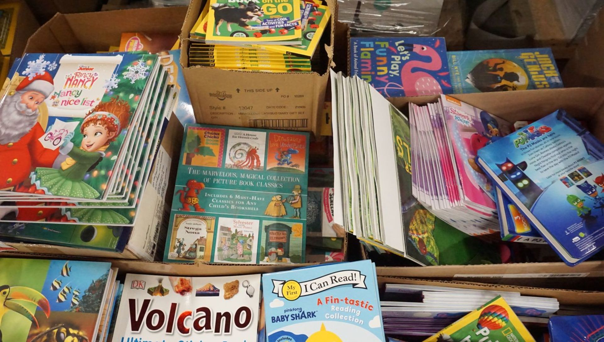 LOT - VOLCANO STICKER BOOKS, SUPER HUMAN ENCYCLOPEDIA PUZZLE BOOK, & BABY SHARK BOOKS (1 SKID) - Image 2 of 2