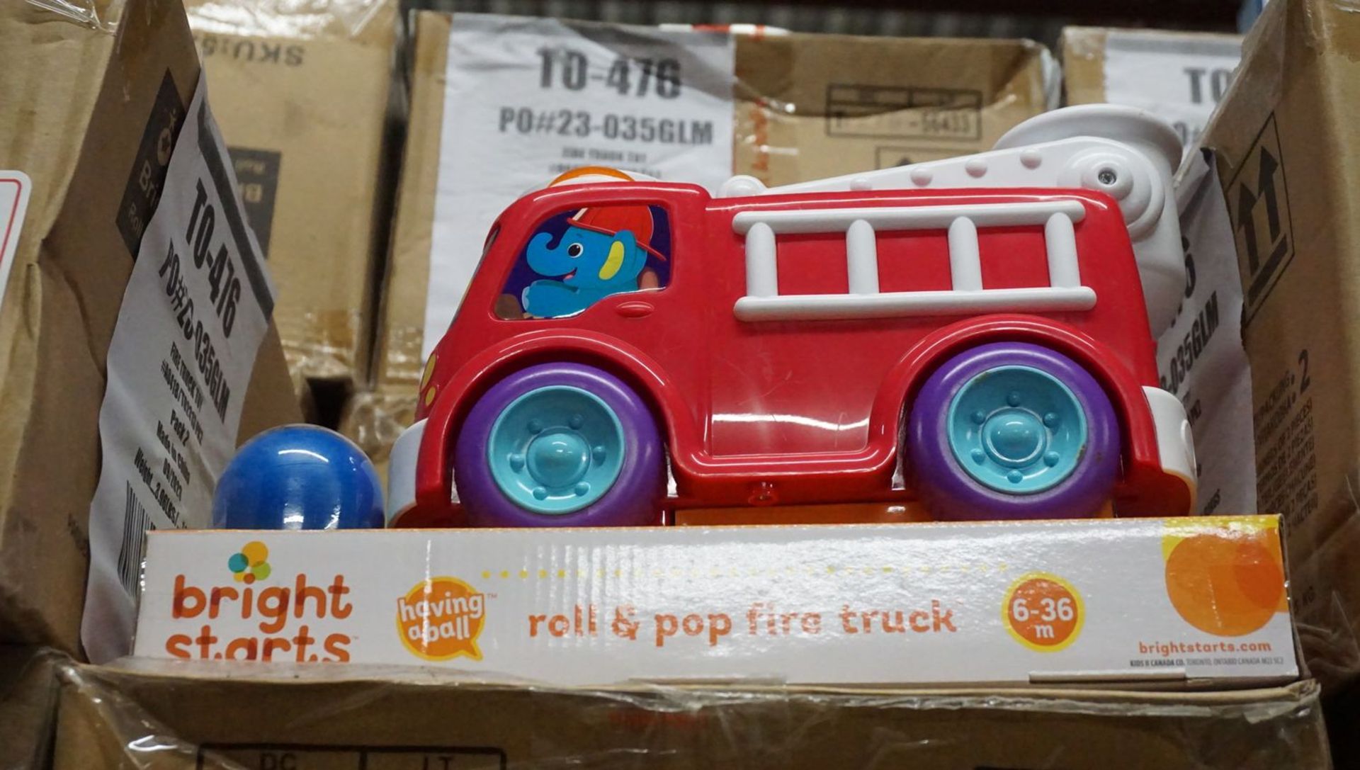 BOXES - KIDS II BRIGHT STARTS ROLL & POP FIRE TRUCKS (52137) (2 PCS/BOX) - Image 2 of 3