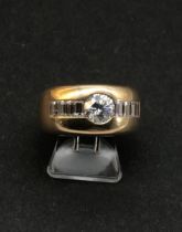 Exner, Goldschmiede: Bandring mit zentr. Brillant ca. 0,7ct, mit flank. Baquettedia.