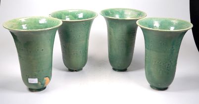 4 hohe Trompeten-Vasen