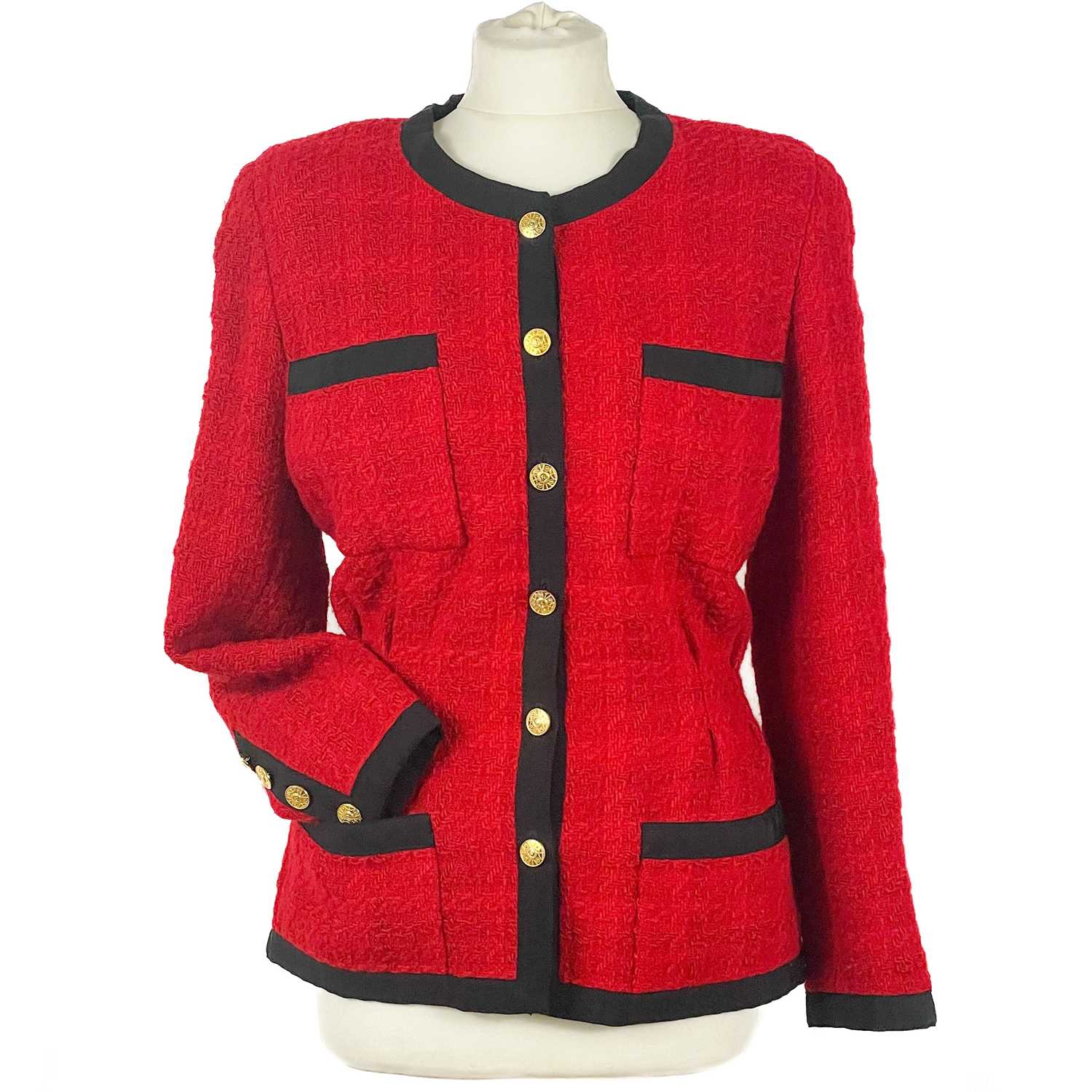 A Chanel 1980's red boucle jacket with gold plated buttons and black trim. - Image 2 of 9